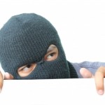 Robber Hiding Under A White Wall by chanpipat (FreeDigitalPhotos.net)